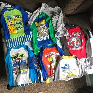 NWOT 7 piece pajama sets. Size 5T Boys.